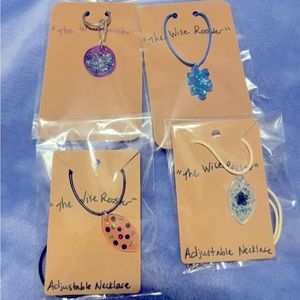 Handmade resin necklace and puzzle piece keychains supporting autism.